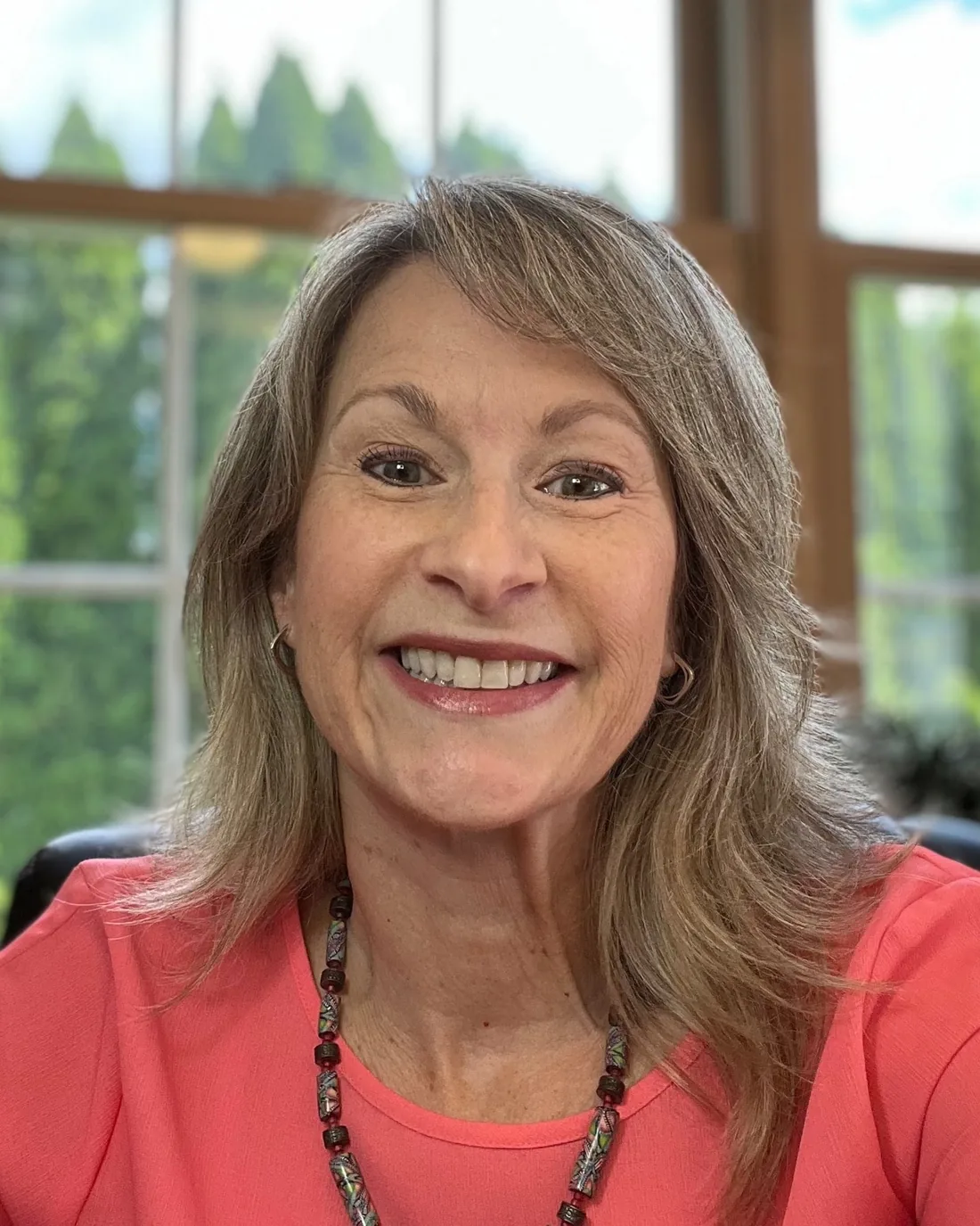 Dr. Janice Fedor smiling in her office